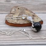 Lovely Gemstone Healing Hands Pendant - Black Agate, Silver Plated Chain.